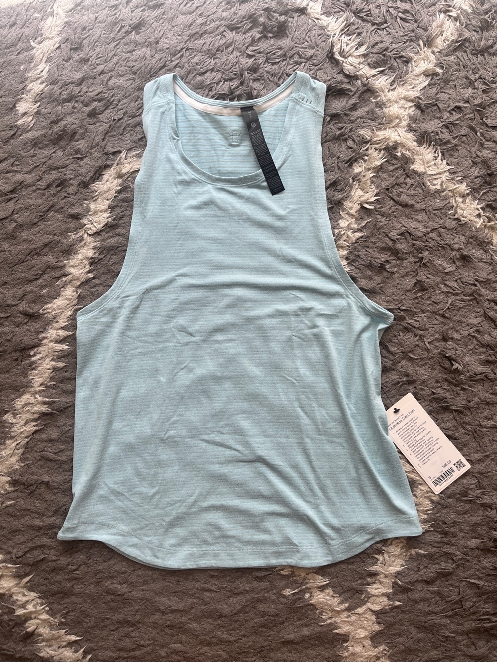 Lululemon license to train tank. Sea foam. Blue. Mens size small. New with tags.